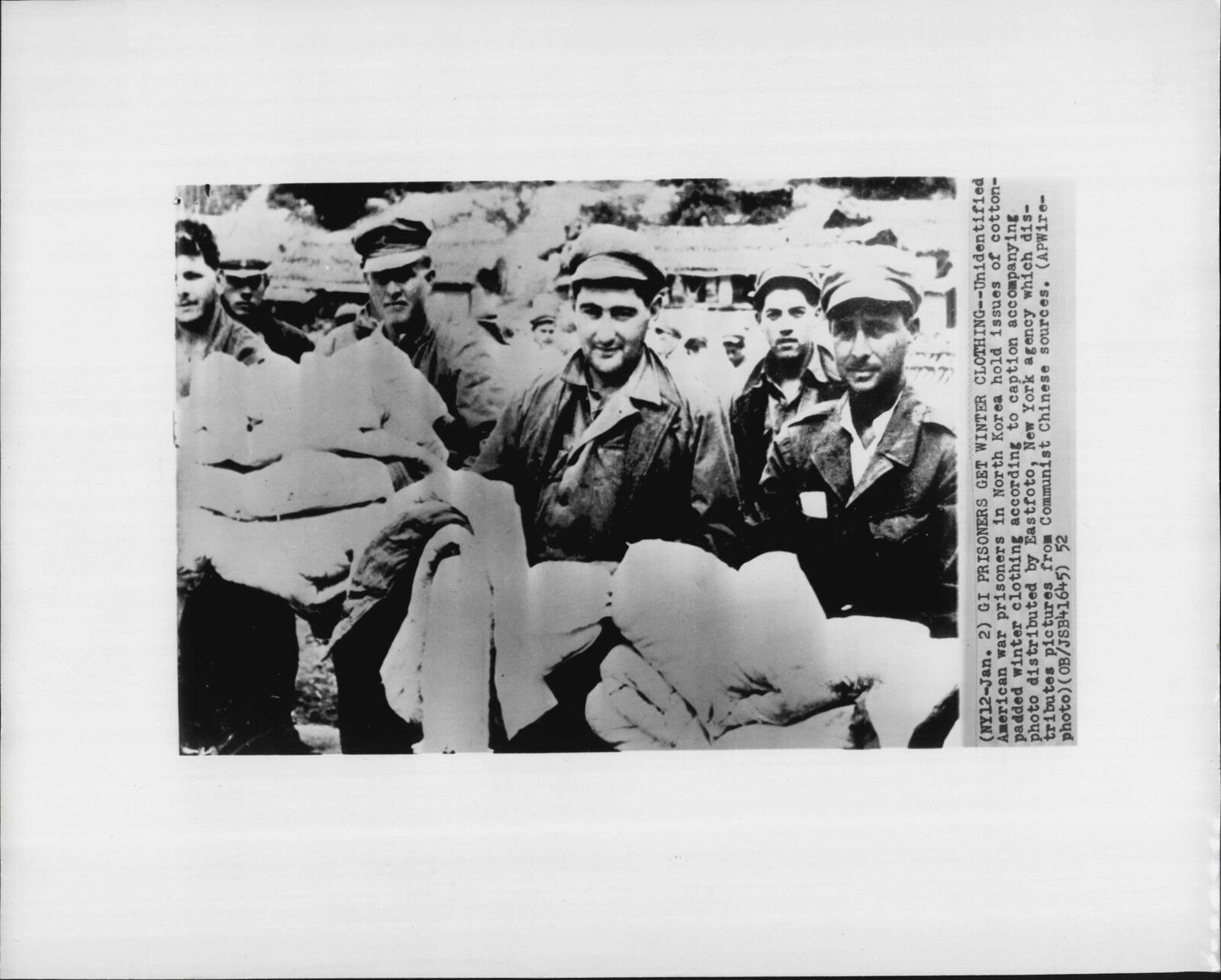 American Prisoners Get New Winer Cloths 1952 Eastfoto Korea War Press Photo Poster painting