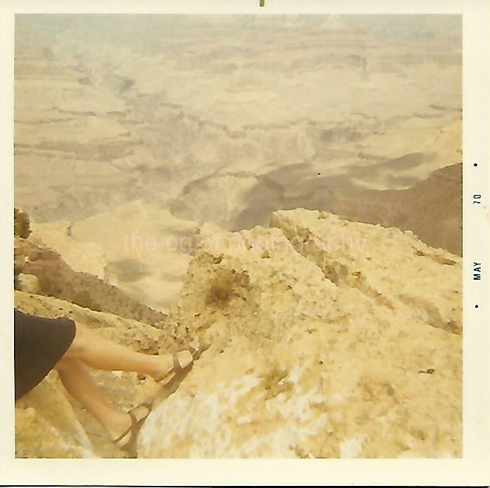 Legs At The Grand Canyon FOUND Photo Poster painting Color AMERICAN WEST Snapshot VINTAGE 13 14