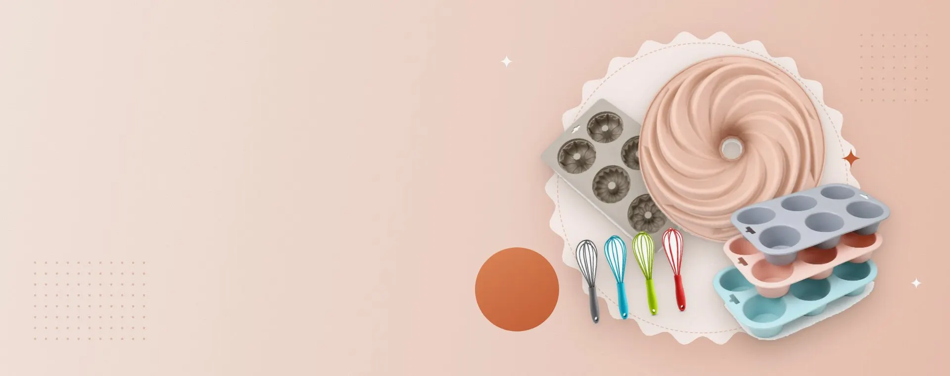 Silicone bundt mold, muffin pans and whisks arranged on a scalloped plate