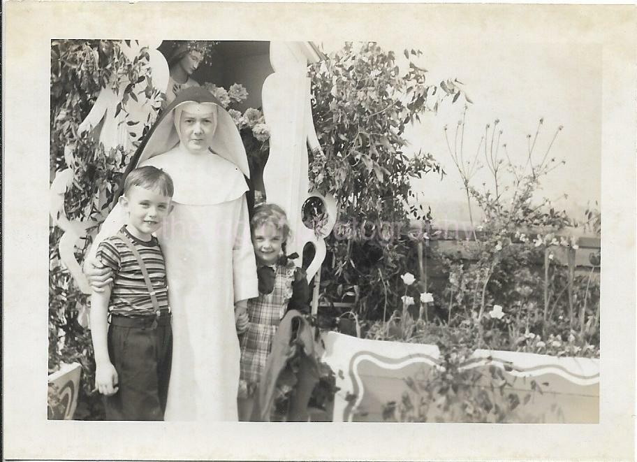 Found Photo Poster paintinggraph bw NUN BOY GIRL Original Portrait VINTAGE 1940′s 19 10 W