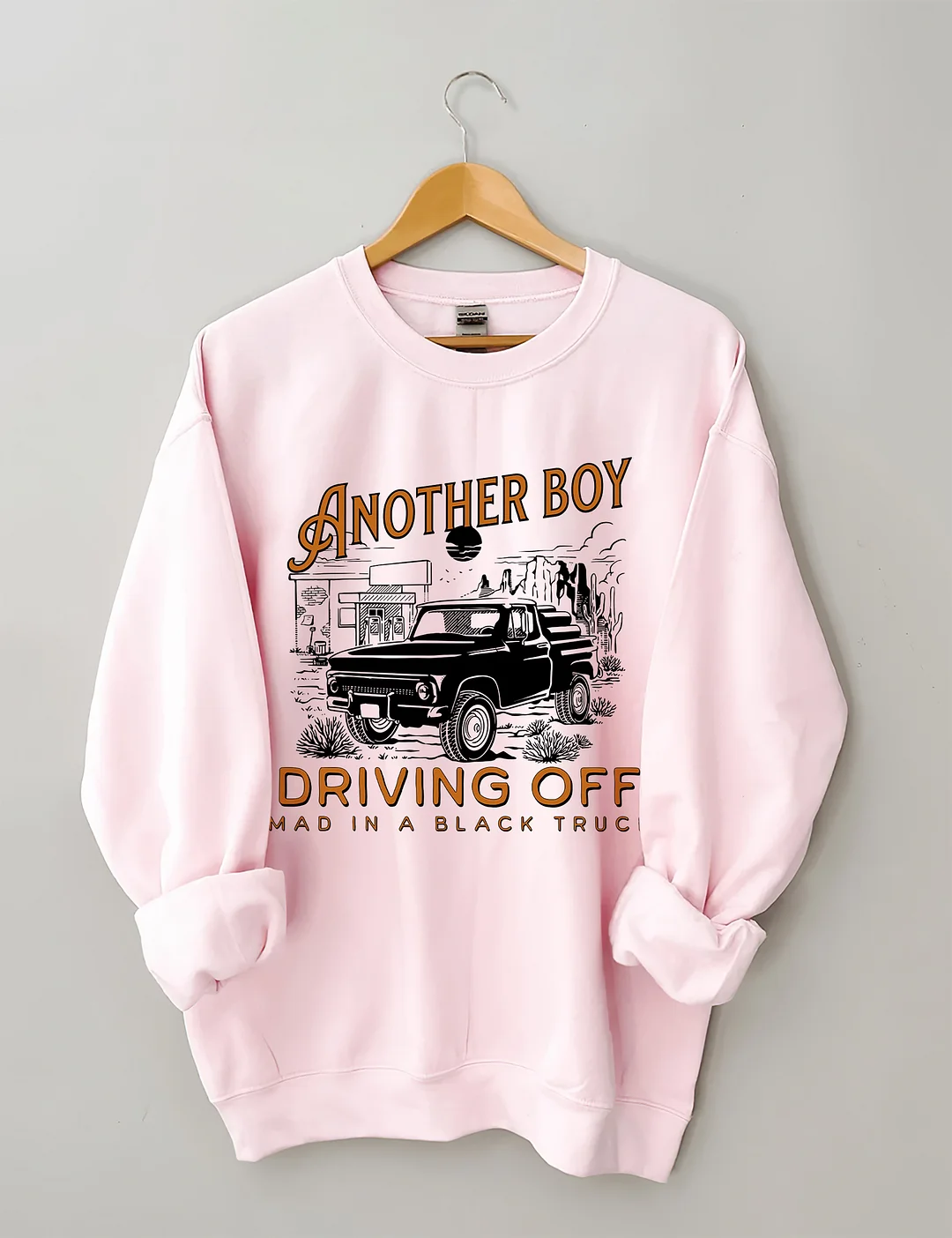 Boy Driving Off Mad Black Truck Sweatshirt