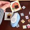 Stamp embossing tool, journal material collector, cutter