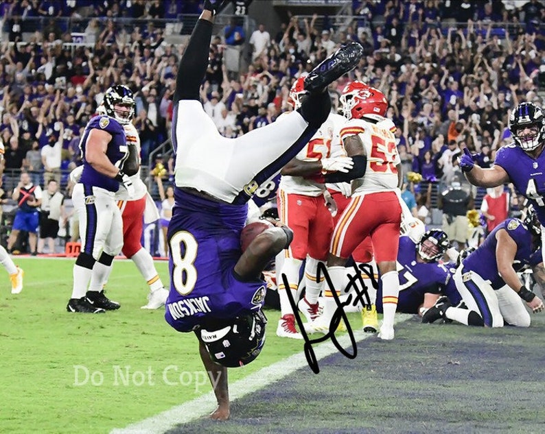 Lamar Jackson Signed Photo Poster painting 8X10 rp Autographed Picture Baltimore Ravens TD !
