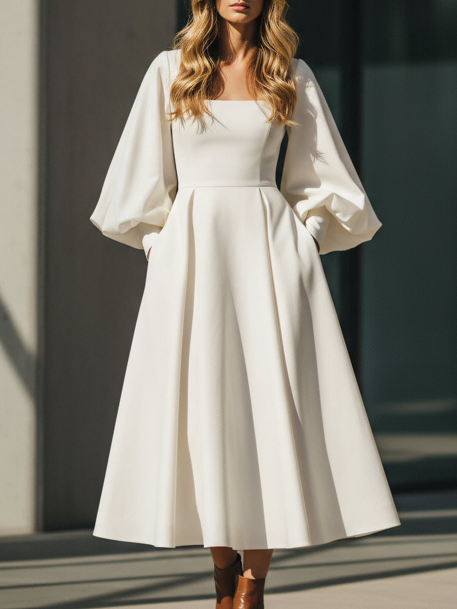 Woman in a casual puff-sleeve dress, romantic and pretty