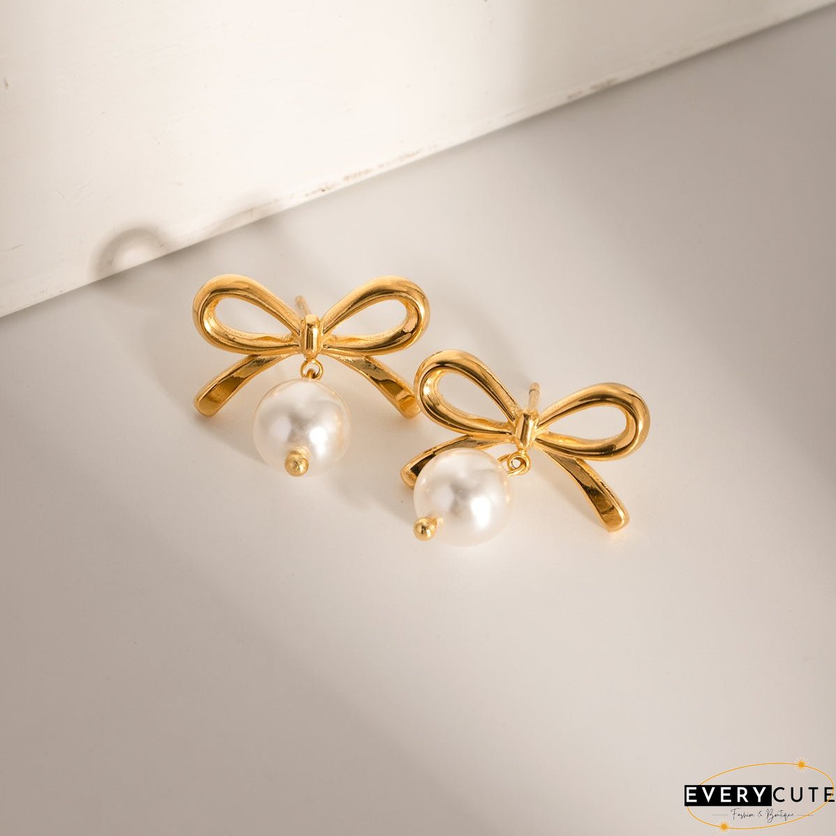 Stainless Steel Bow Pearl Earrings
