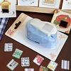 Stamp embossing tool, journal material collector, cutter
