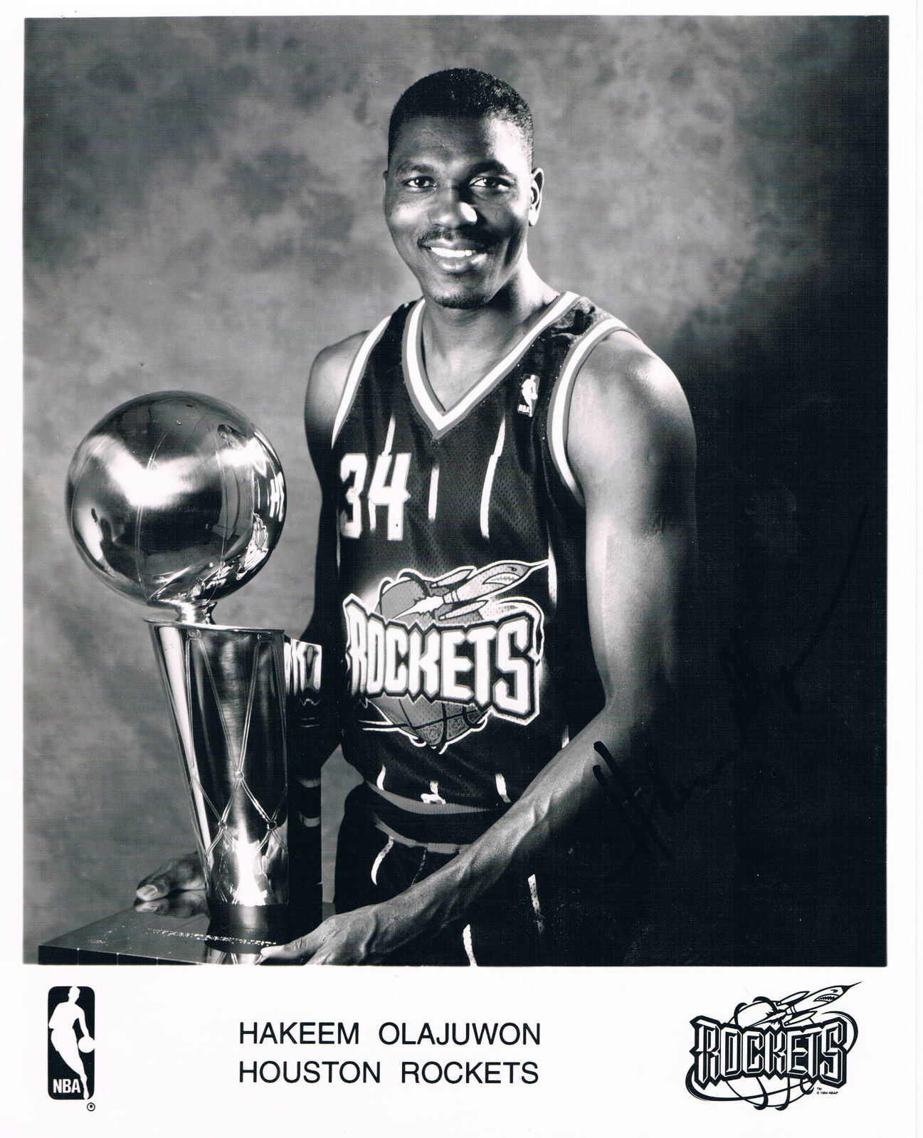 Hakeem Olajuwon 1963- genuine autograph 8x10