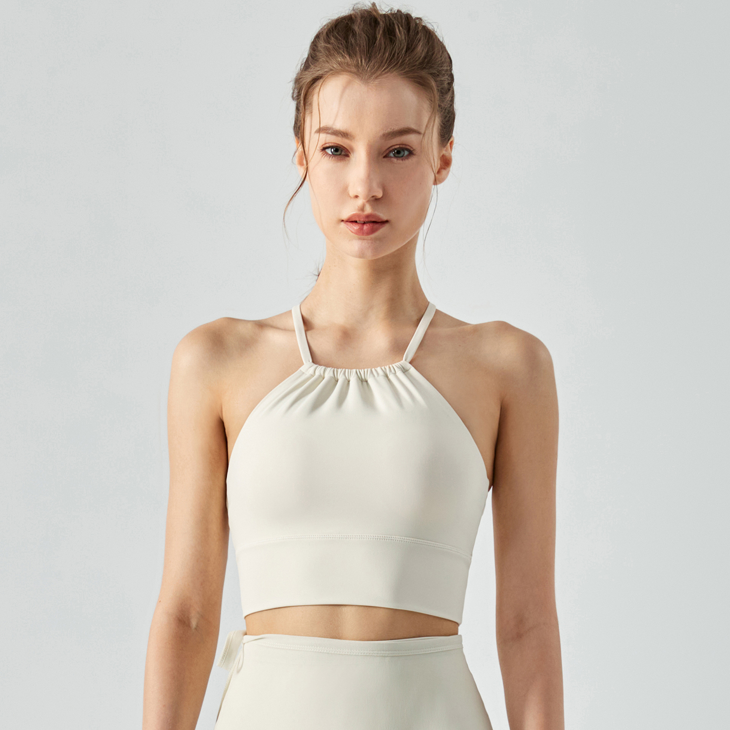 Buy widened hem front collar scrunch padded halter strap cross back sports bra of high quality on Hergymclothing Ivory White