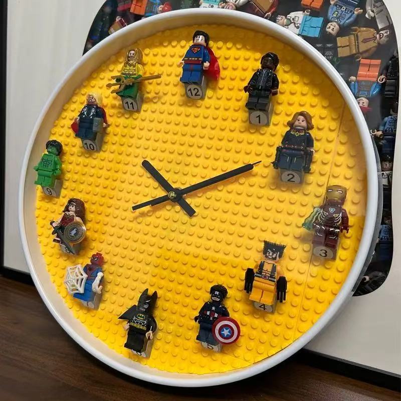 Where childhood wonder meets everyday timekeeping. Handcrafted with iconic superhero minifigures on a classic green baseplate dial