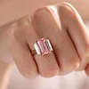 14K Rose and White Gold 13*6.5mm Emerald Cut Lab Pink Sapphire and Two Baguette Cut Lab Diamond Three Stone Cocktail Ring with Tapered Band