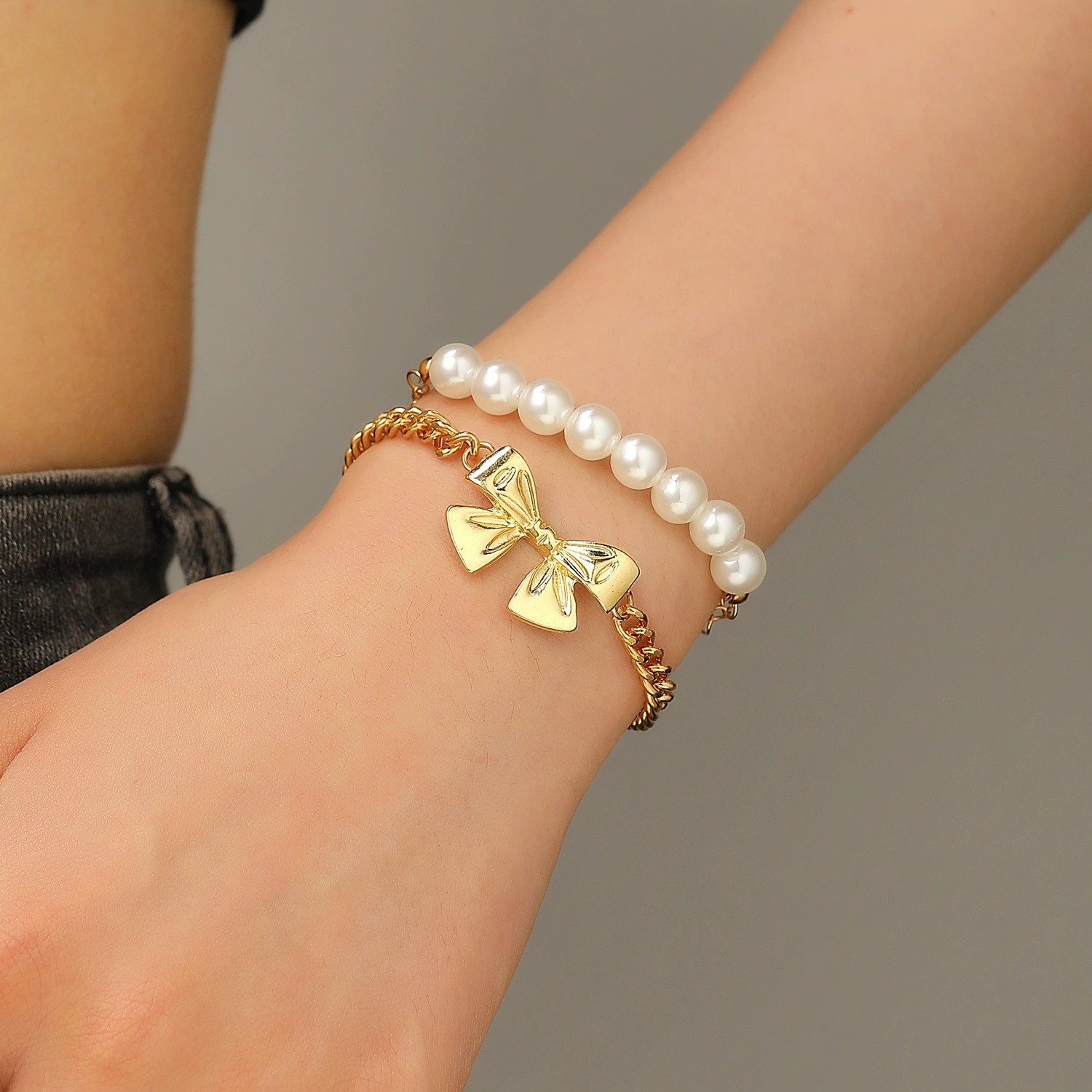 Ribbon pearl two-strand gold-plated bracelet