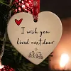 Ornement suspendu en forme de coeur en c&eacute;ramique de No&euml;l