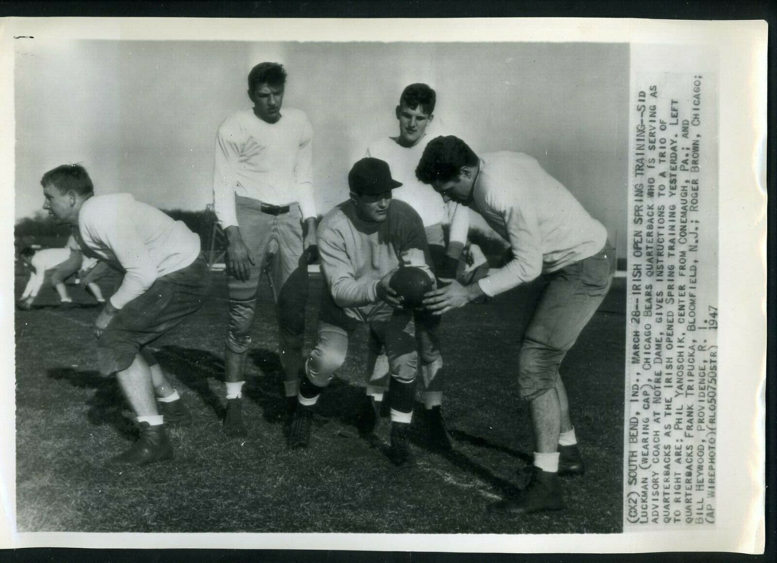 Sid Luckman with Note Dame players Yanoschik Tripuka Heywood 1947 Press Photo Poster painting