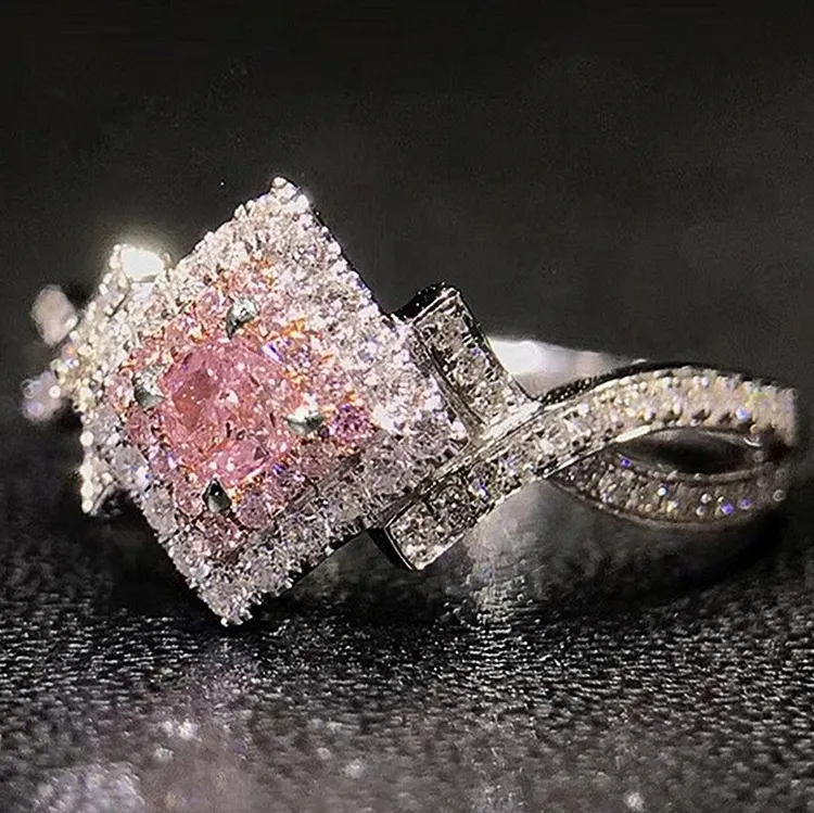 Twist Design Women's Ring with Pink Zirconia Accents