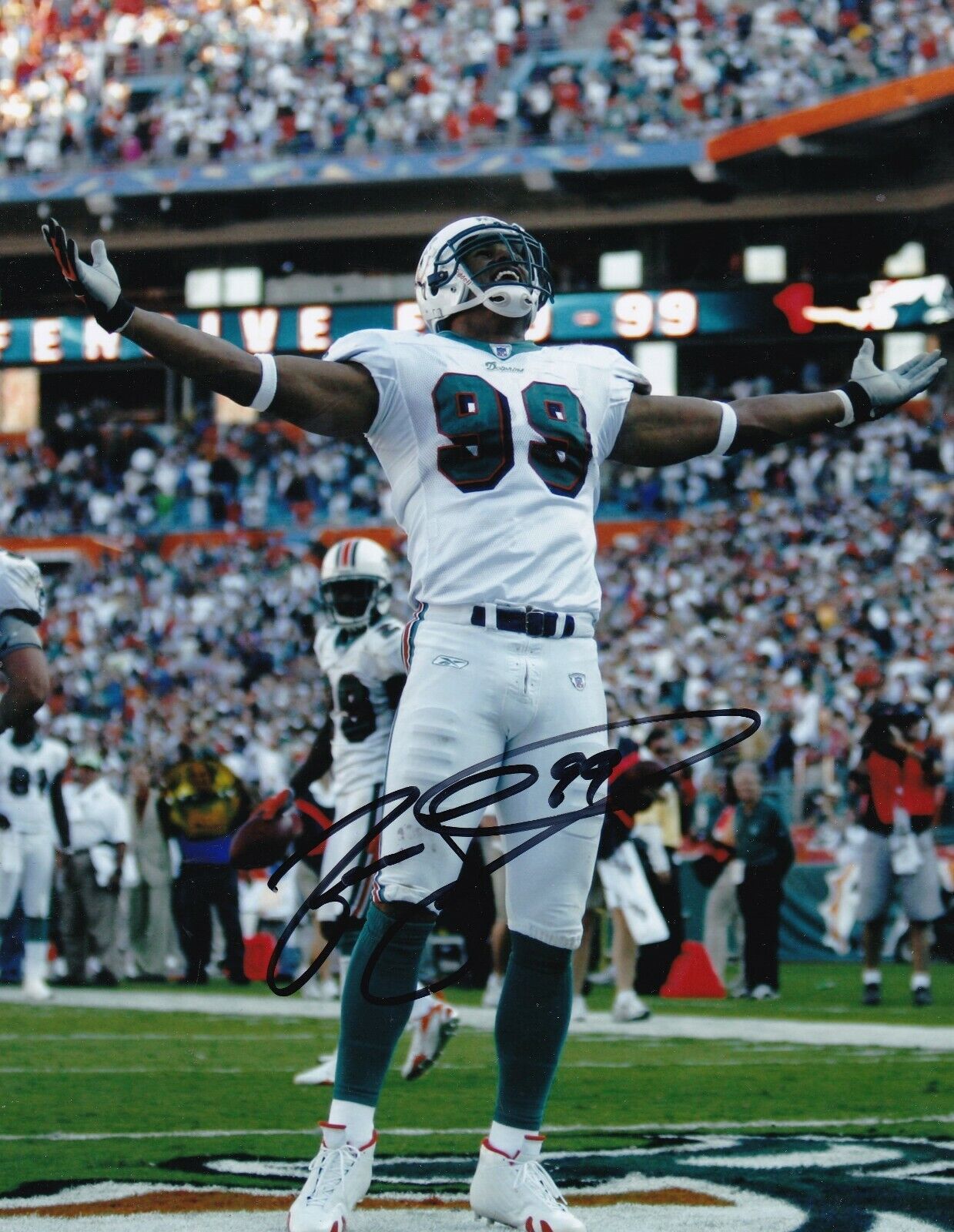 JASON TAYLOR MIAMI DOLPHINS ACTION SIGNED 8x10 Photo Poster painting