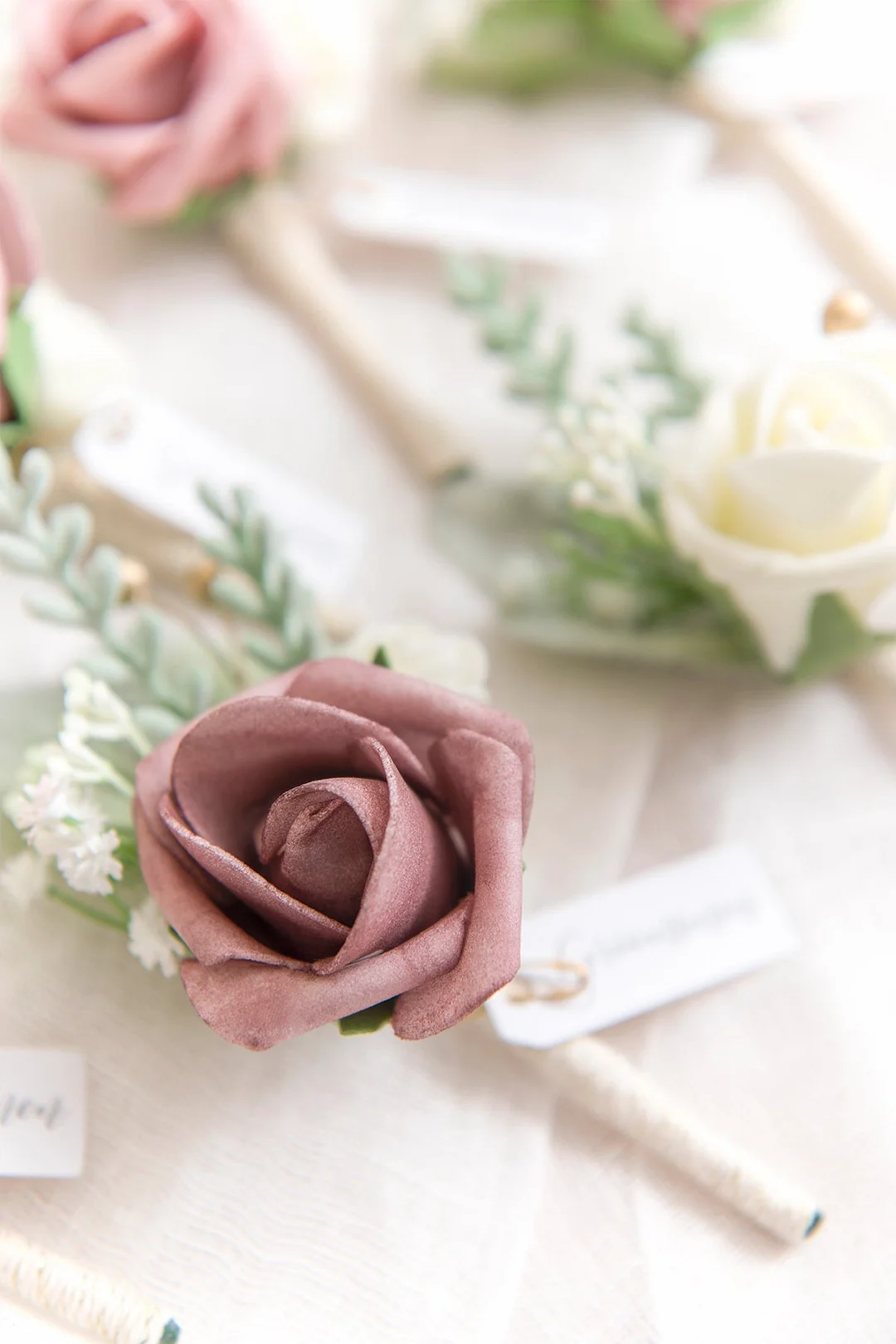 Boutonnieres in Dusty Rose & Cream