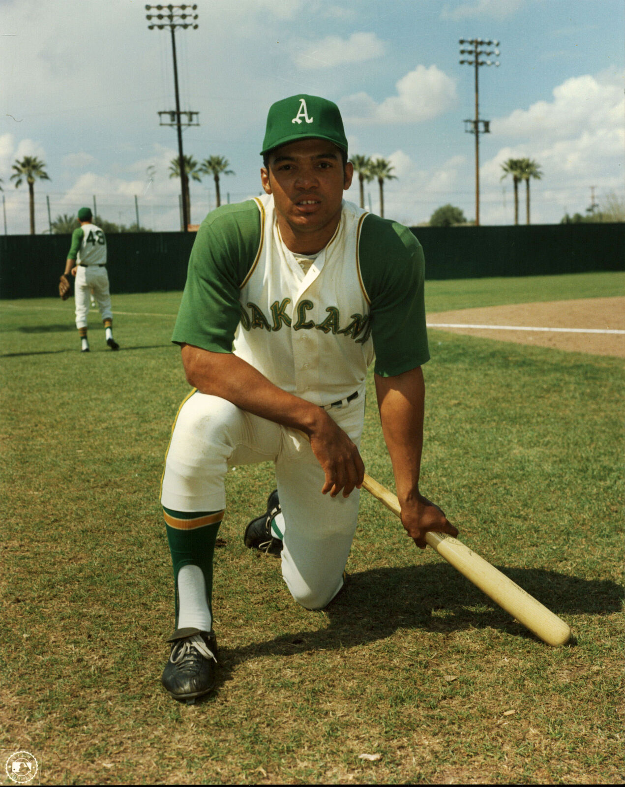 Athletics Reggie Jackson 8x10 Photo Poster paintingFile Kneeling On Bat Photo Poster painting Un-signed