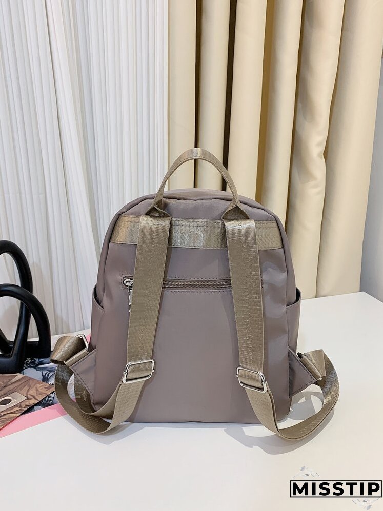 Metal Decor Quilted Backpack