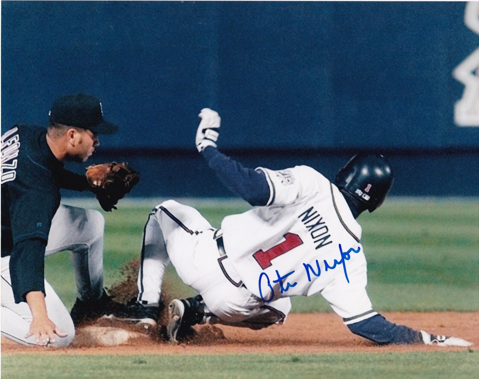 OTIS NIXON ATLANTA BRAVES ACTION SIGNED 8x10