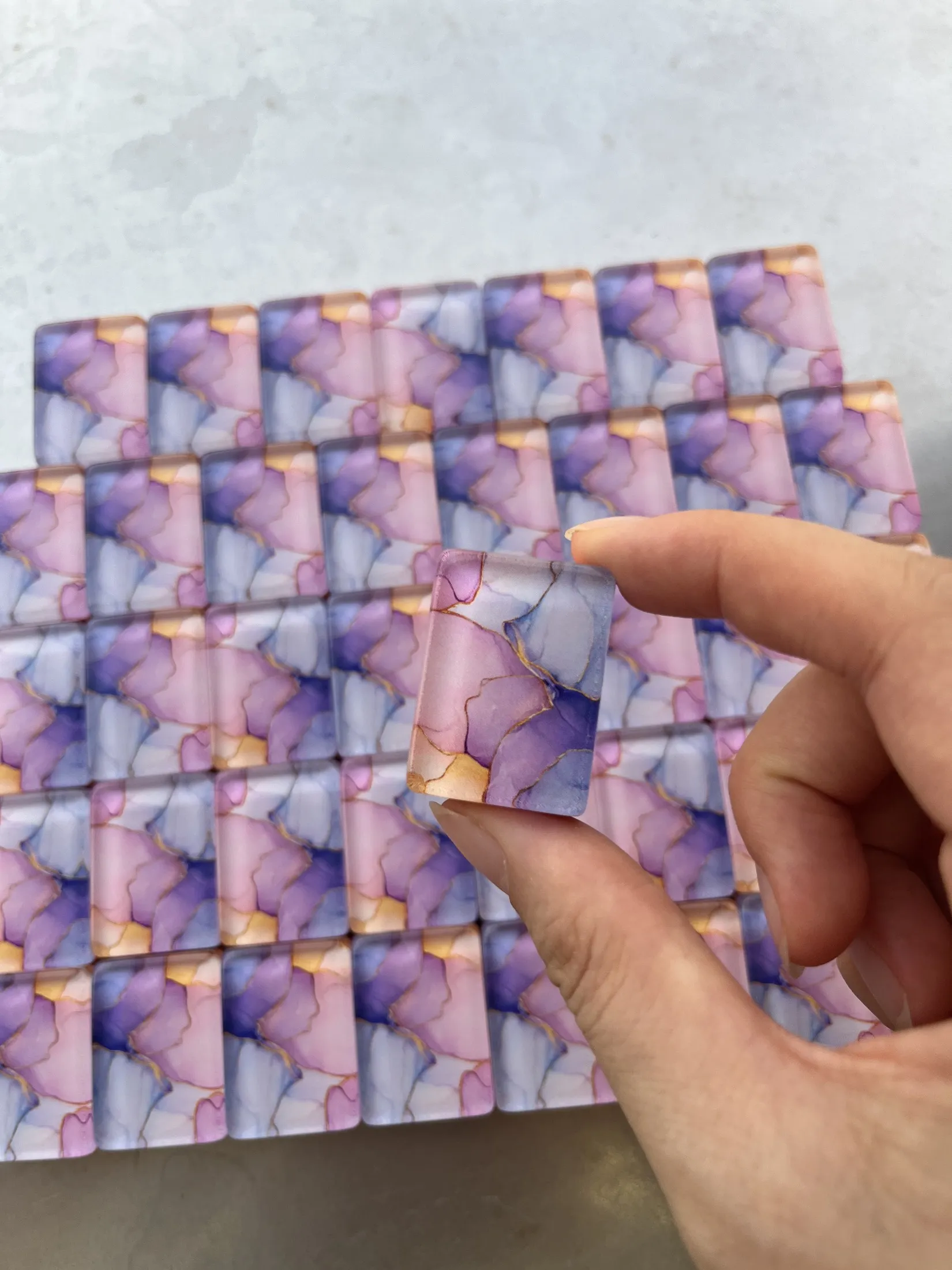 The real set gathered to show its violet, blush and gold palette.