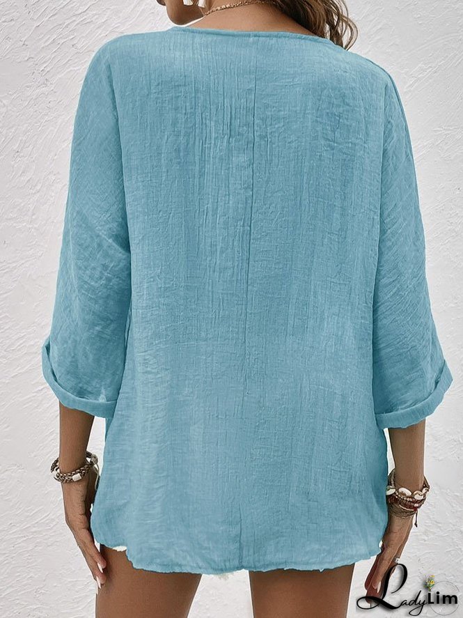 Blue linen V-neck shirt