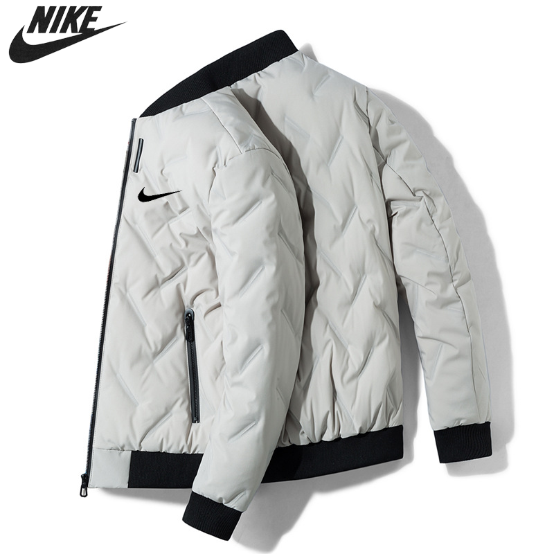 ciepła kurtka puchowa na zimę — Nike