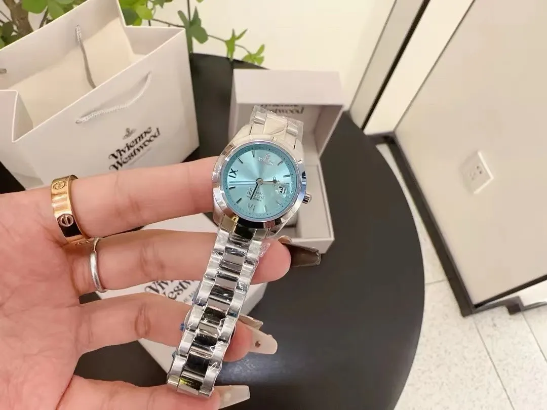 Vivienne Westwood Light Blue Dial Silver Band Saturn Watch - 28MM