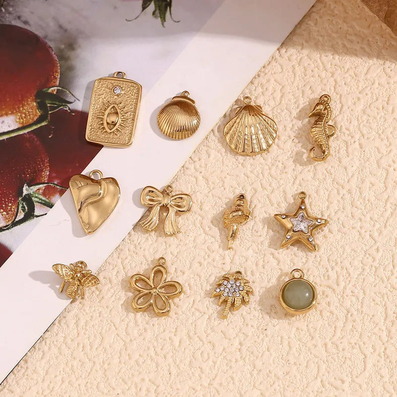 1 Piece 15*19.5mm 7.7*20.5mm 9.3*14.2mm 304 Stainless Steel 14K Gold Plated Ocean Bow Knot Shell Jewelry Accessories Pendant