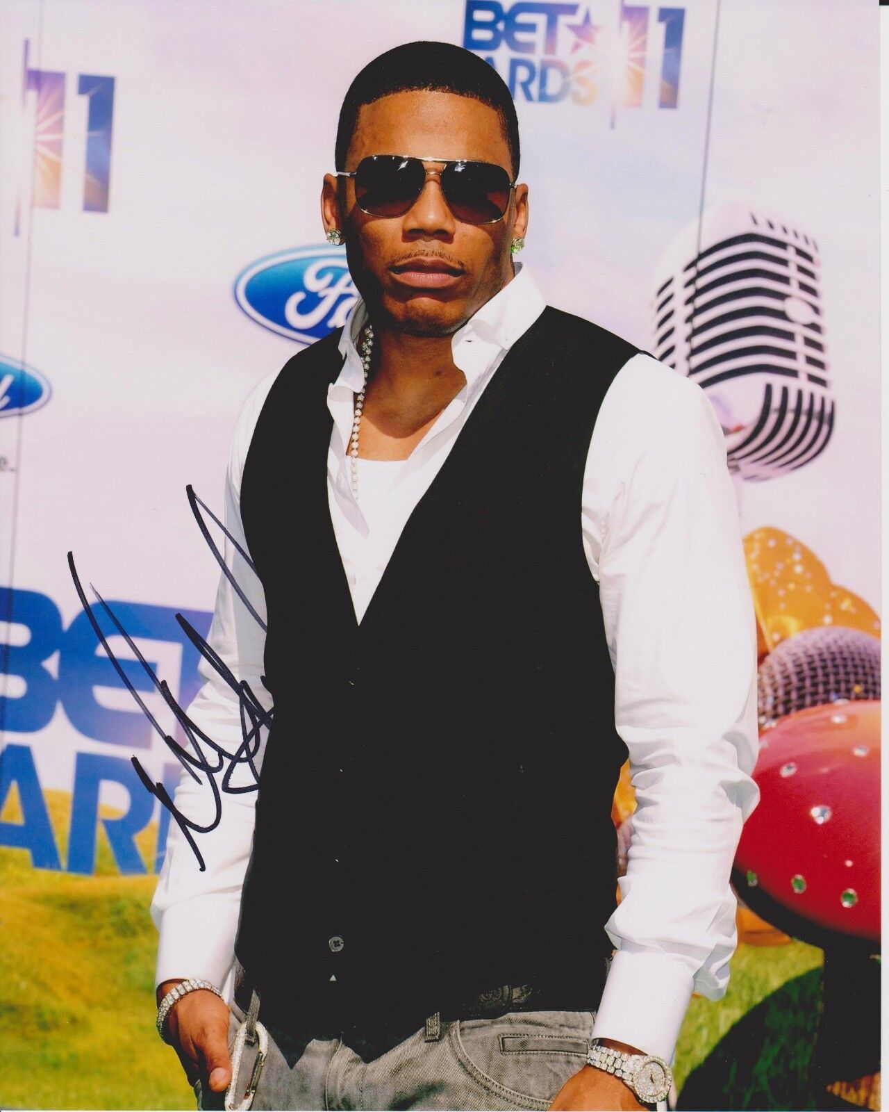 NELLY RAPPER signed 8X10 Photo Poster painting (ST. LUNATICS,T.I, JAY-Z, LUDACRIS)