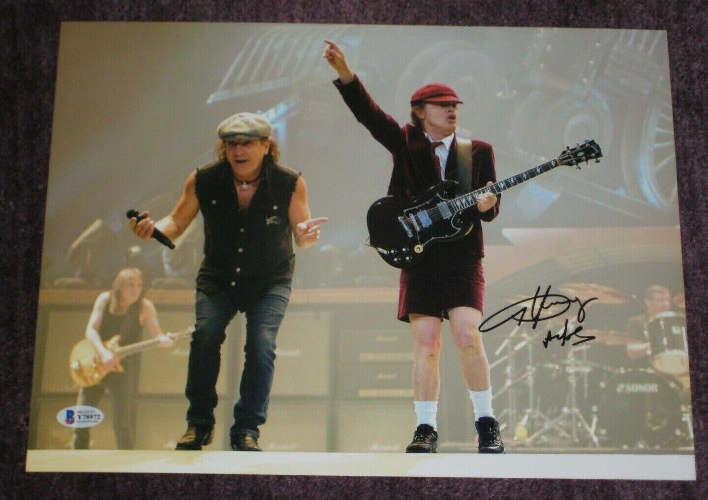 ANGUS YOUNG Signed AC/DC in Concert 11x14 Photo Poster painting with Beckett COA