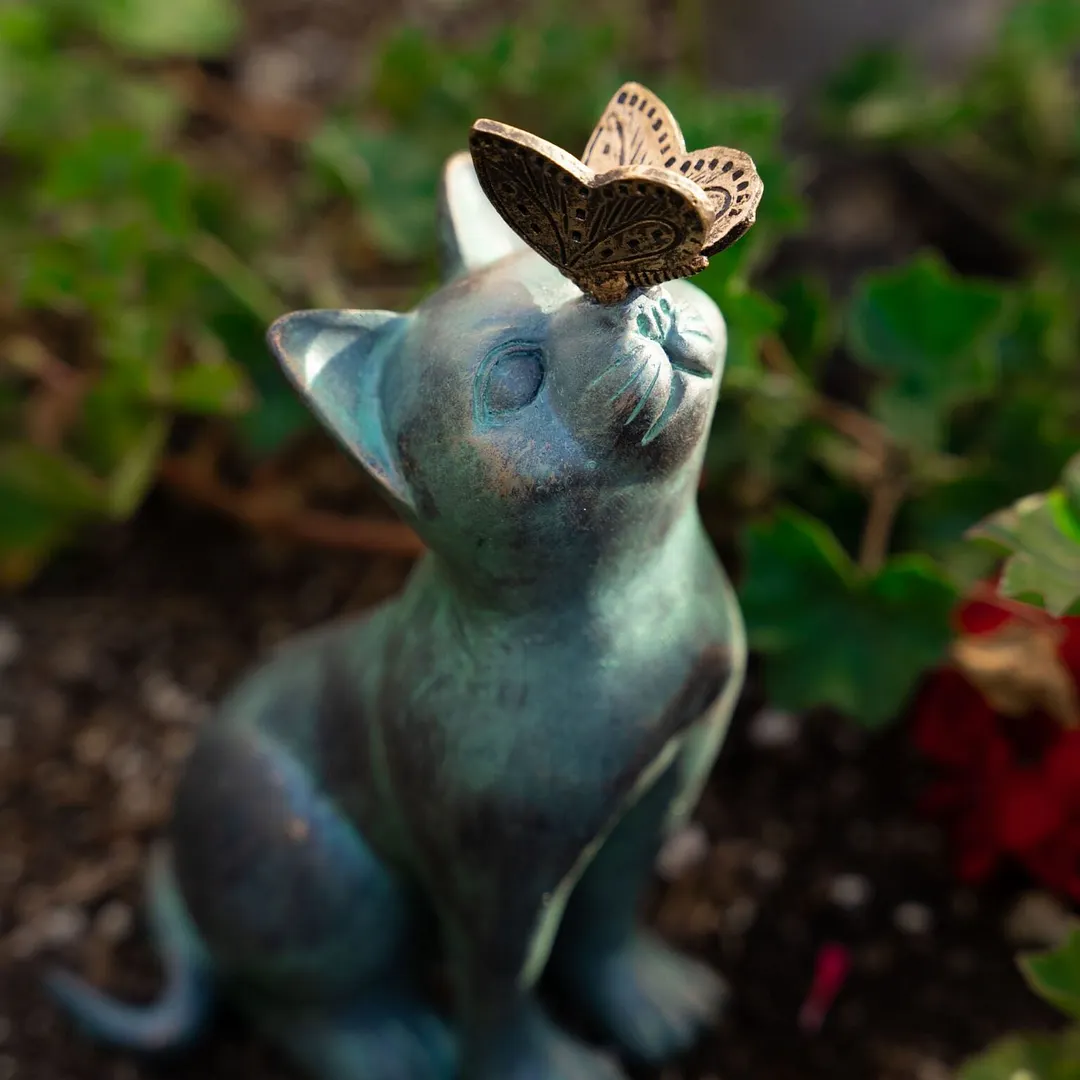 Curious Cat with Butterfly Statue