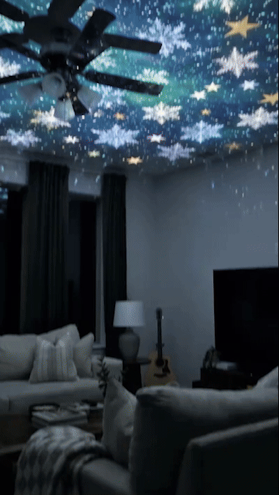 Christmas USB projection lamp creating festive patterns in a room