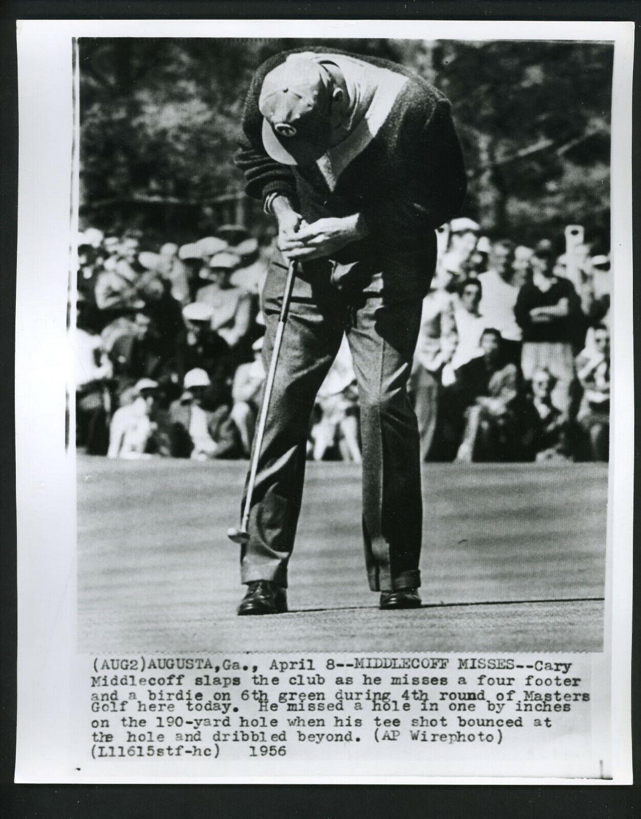 Cary Middlecoff putts on the 6th green during 1956 Masters Press Photo Poster painting