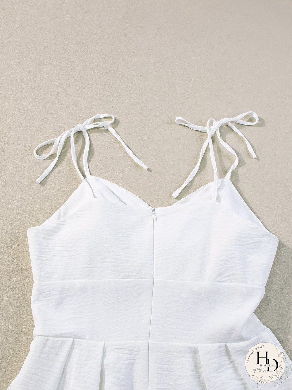 Elegant Beige Pleated Wide Leg Jumpsuit with Spaghetti Straps