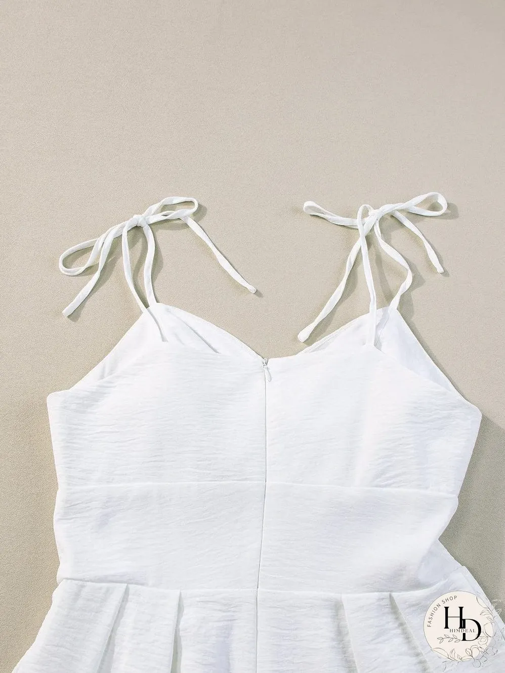 Elegant Beige Pleated Wide Leg Jumpsuit with Spaghetti Straps