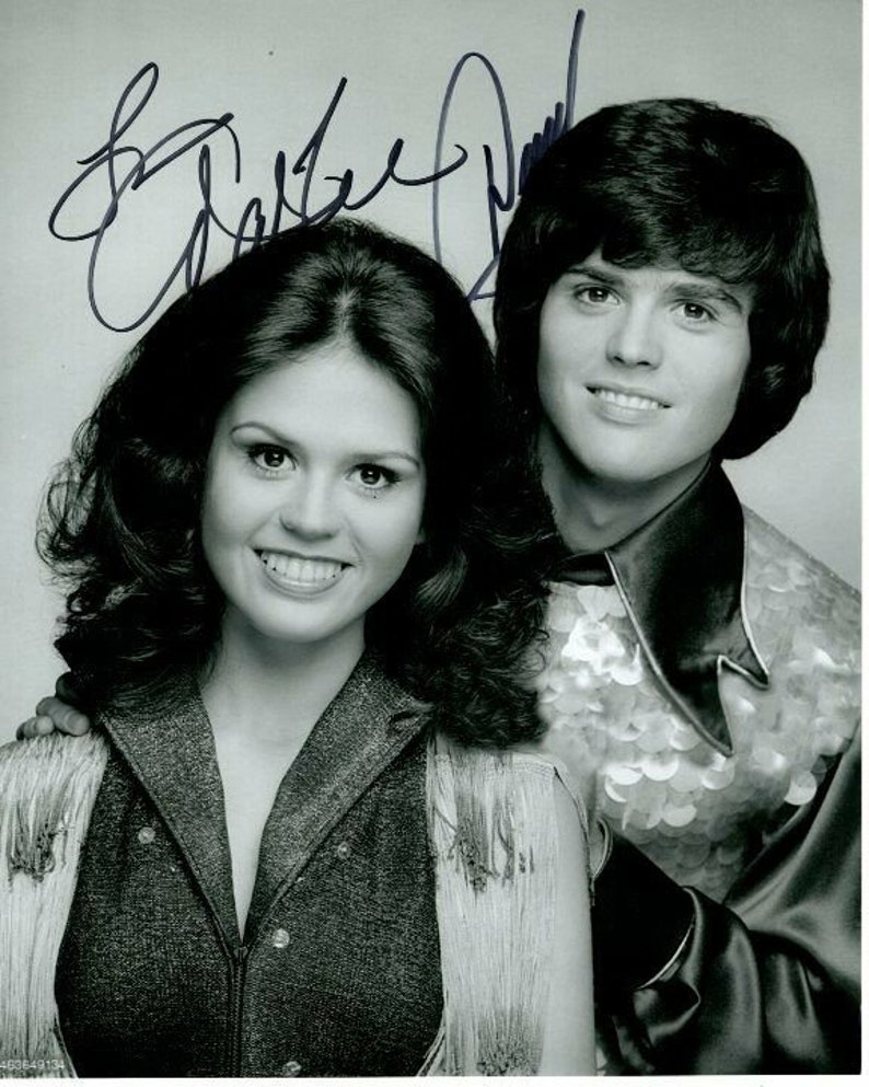 Donny and marie osmond signed autographed Photo Poster painting