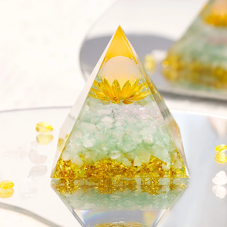 healing orgone pyramid with lotus symbol