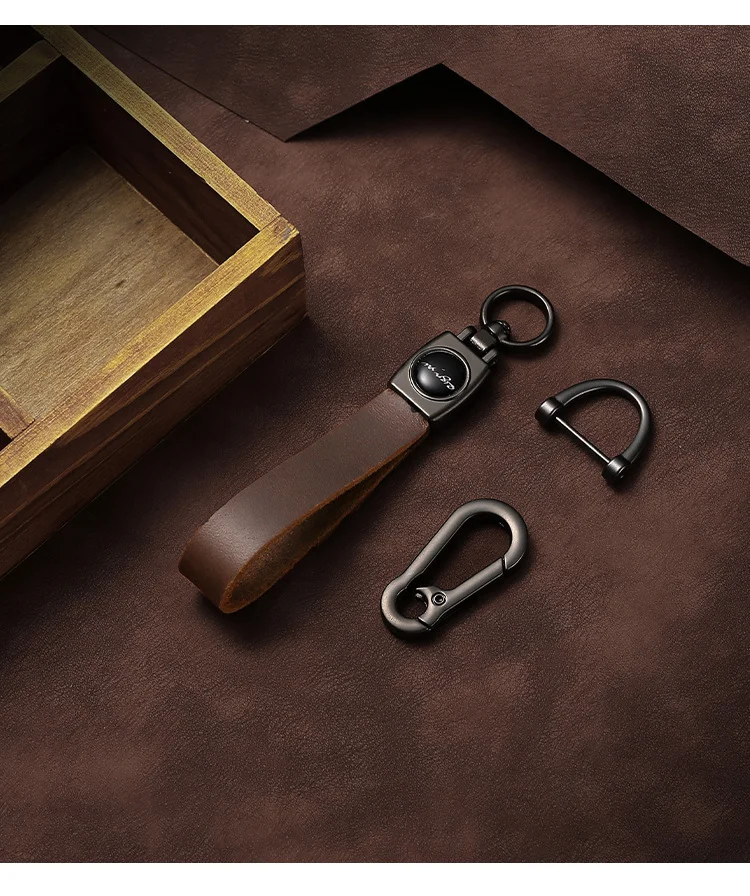 🔥Hot sale🔥Exclusive logo🔥Car anti-lost genuine leather alloy keychain