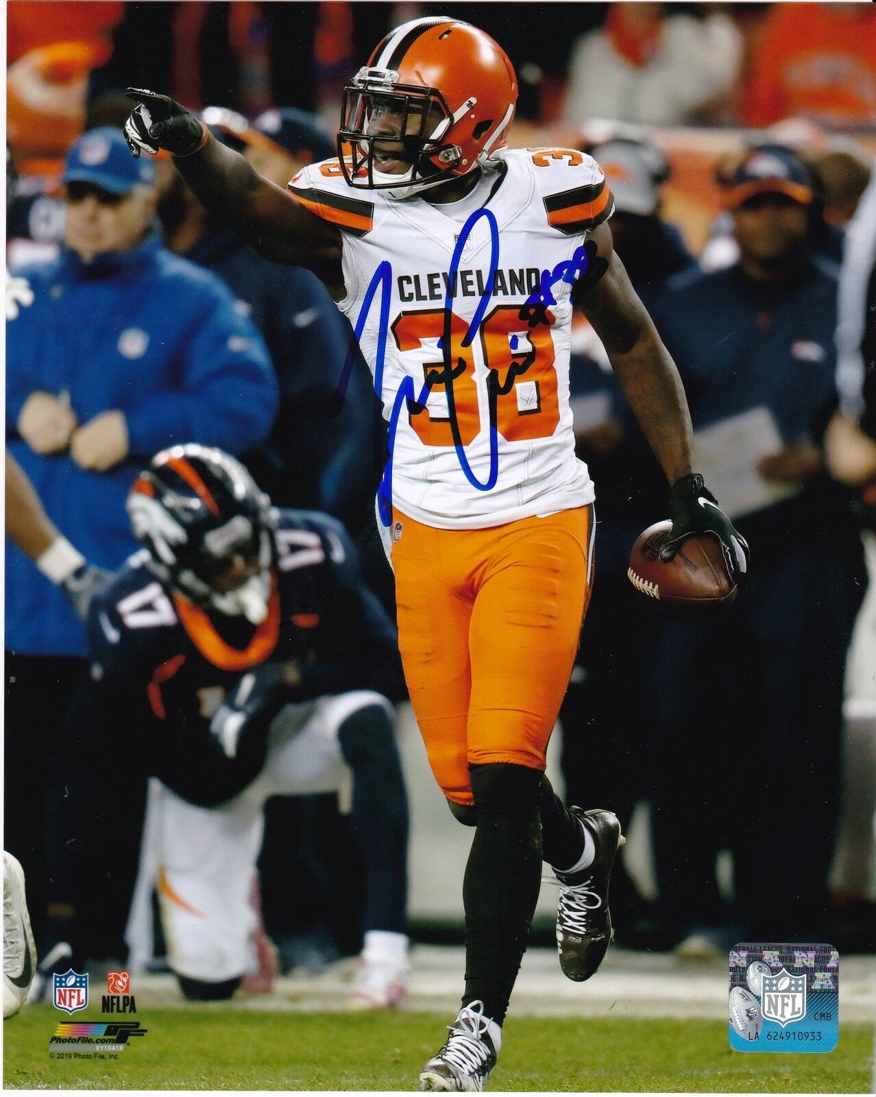 TJ CARRIE CLEVELAND BROWNS ACTION SIGNED 8x10