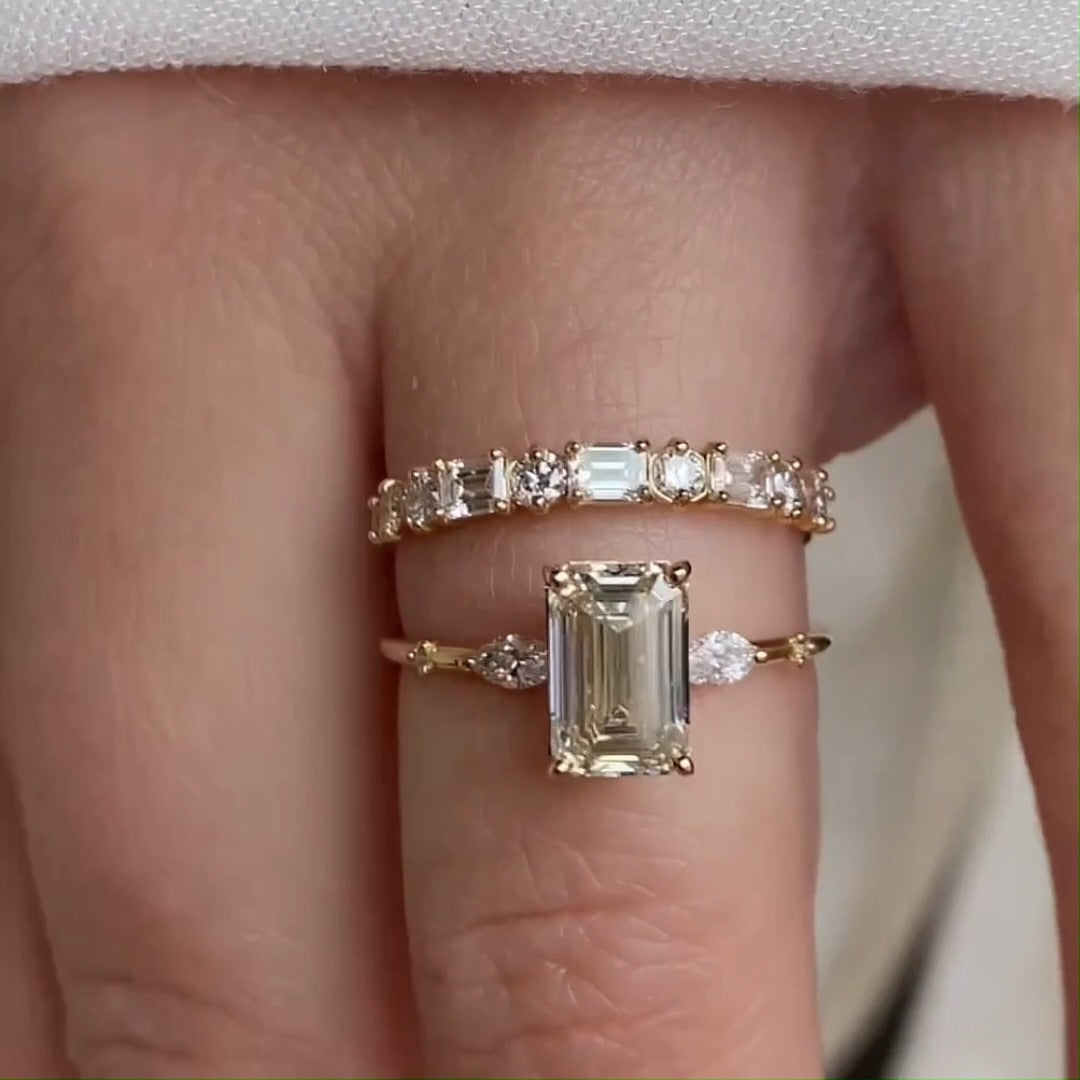 Luxurious Golden Tone Emerald Cut Three Stone Sterling Silver Bridal Set