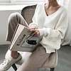 Sweater With Irregular Hem In Solid Color