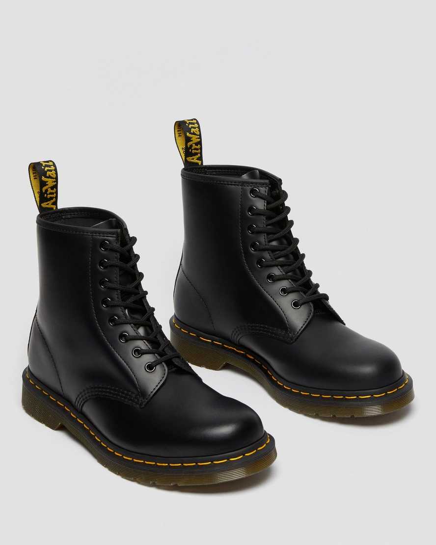 black boots with yellow thread