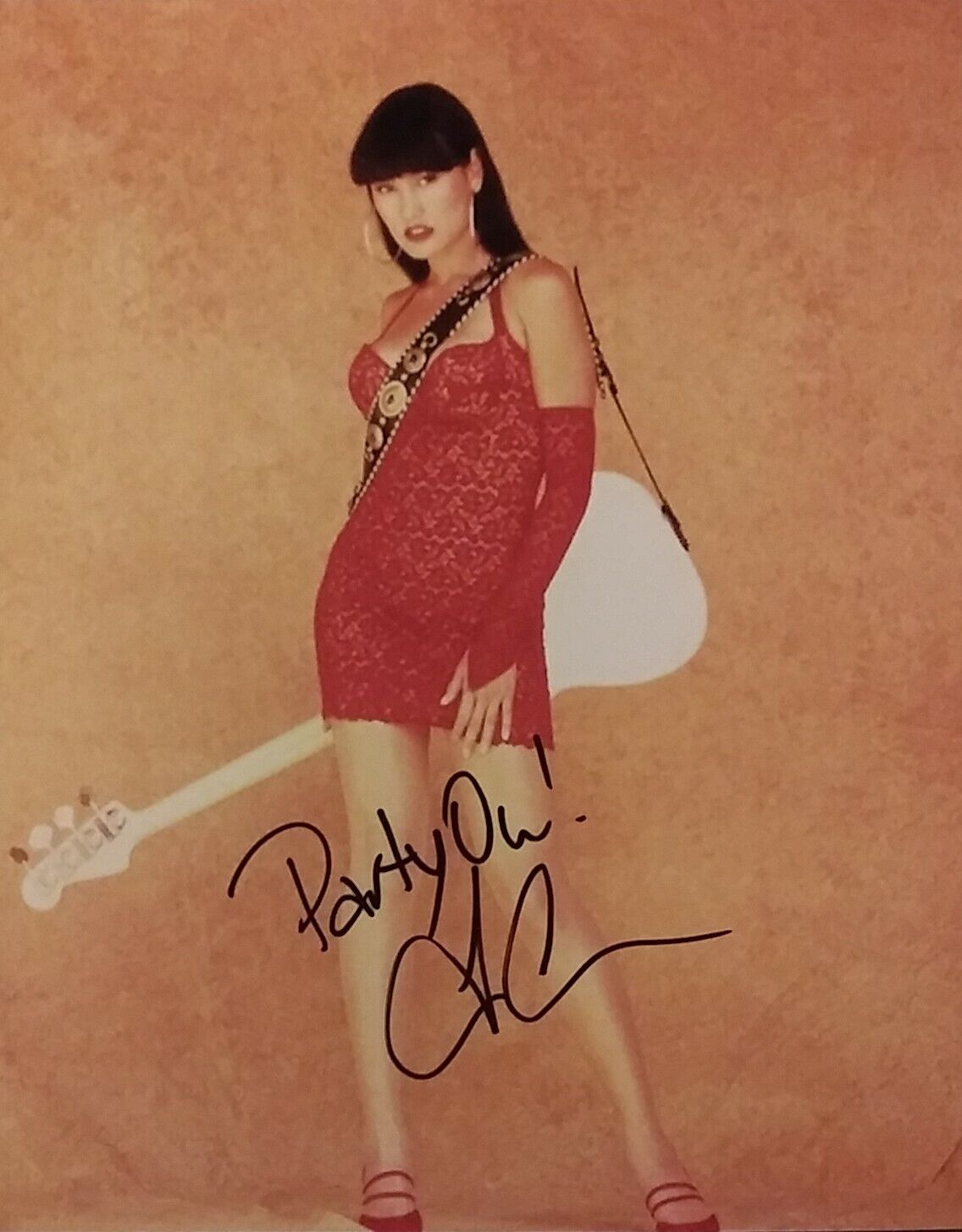 Tia Carrere signed 8 x 10