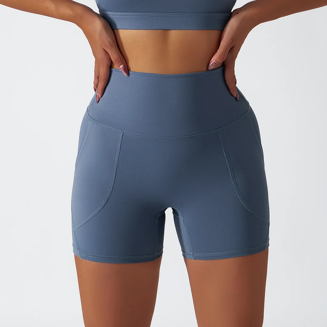 Buy Hergymclothing Haze Blue renewable fabric sustainable no front seam yoga shorts with side pockets online