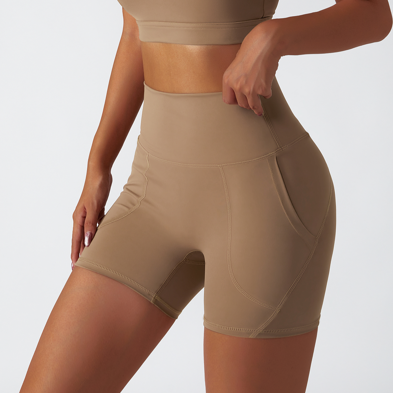 Buy Hergymclothing Camel Brown renewable fabric sustainable no front seam yoga shorts with side pockets at an affordable price