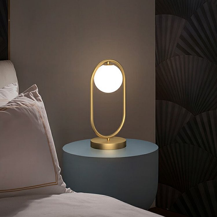 Minimalist Oval Frame Table Lighting Metal 1-Head Bedroom Night Light with Ball Milk Glass Shade in Gold