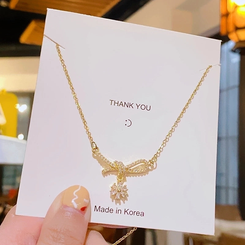 304 Stainless Steel Copper 18K Gold Plated K Gold Plated Inlay Bow Knot Zircon Pendant Necklace