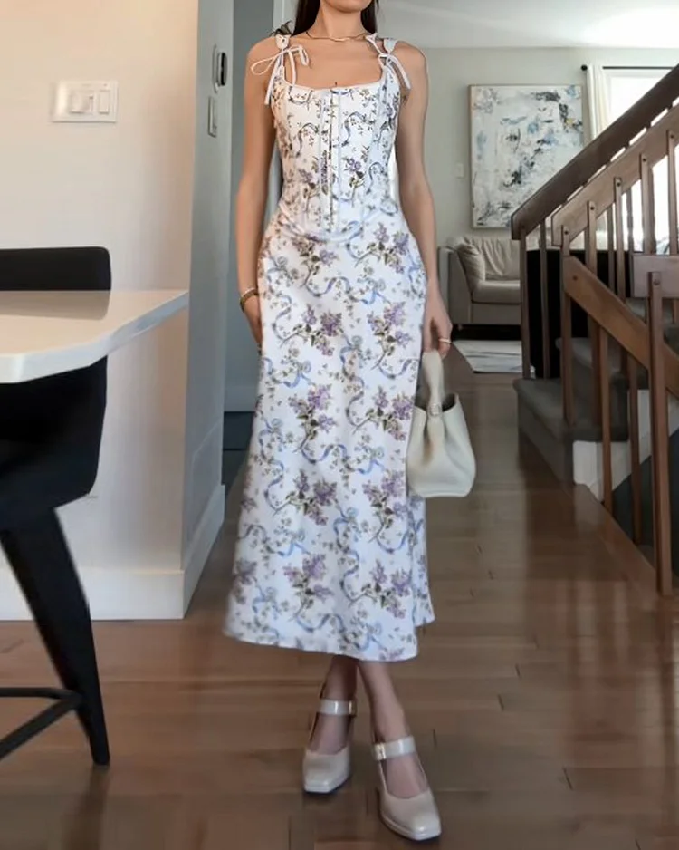 Sleeveless printed tie dress