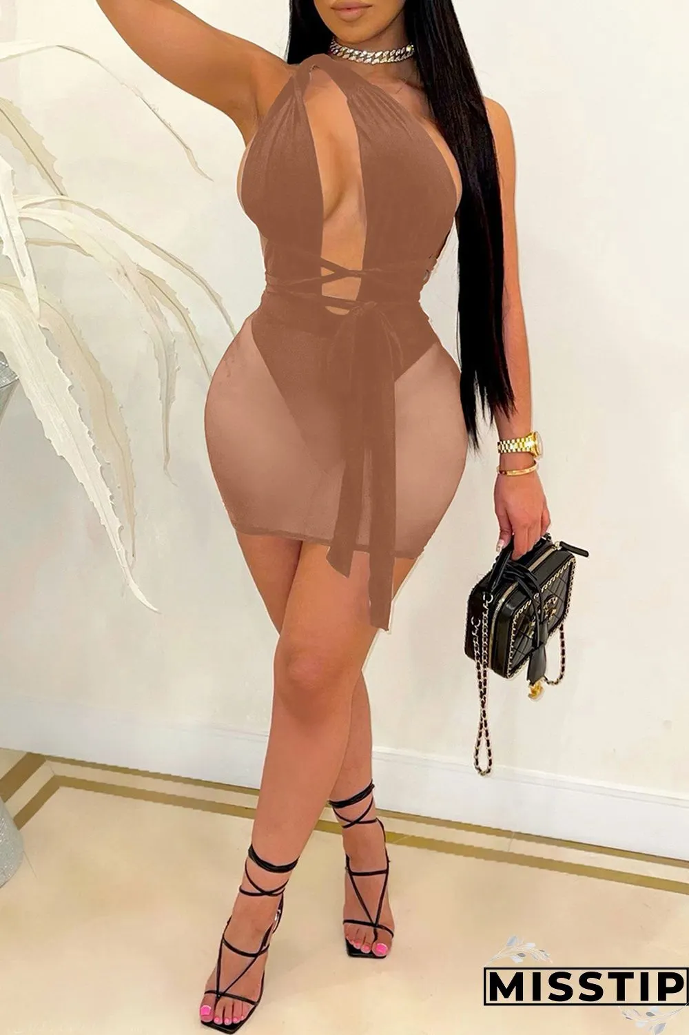 Khaki Fashion Sexy Patchwork Bandage Hollowed Out Backless One Shoulder Sleeveless Dress