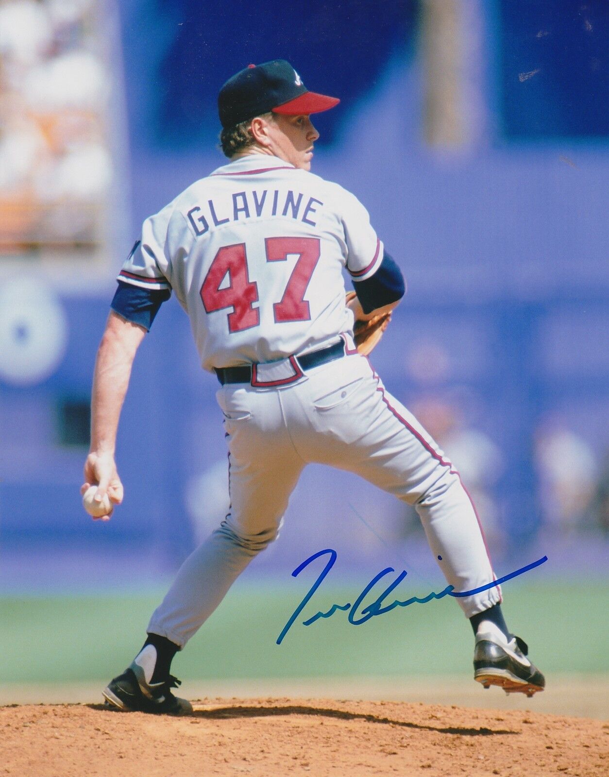 TOM GLAVINE ATLANTA BRAVES ACTION SIGNED 8x10